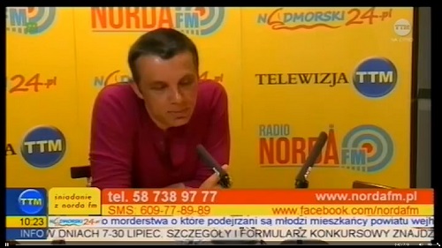 Obraz przedstawia prof. Dariusza Paradowskiego występującego w telwizji TTM